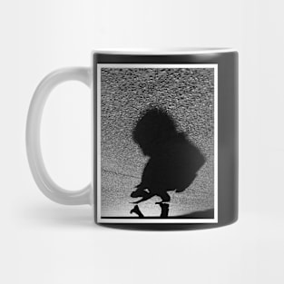 Shadow casts a human Mug